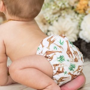 CLOTH NAPPIES Little Lamb Onesize nappy with giraffe pattern on a white background.