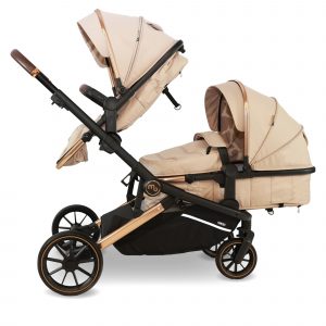 DOUBLES AND TANDEMS My Babiie double pushchair in Giraffe cream fabric shown in carrycot and seat mode.
