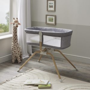 CRIBS Air motion gliding crib in grey fabric with mesh side panels on a wooden frome